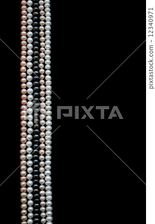 White, black and pink pearls on the black silk 12340971