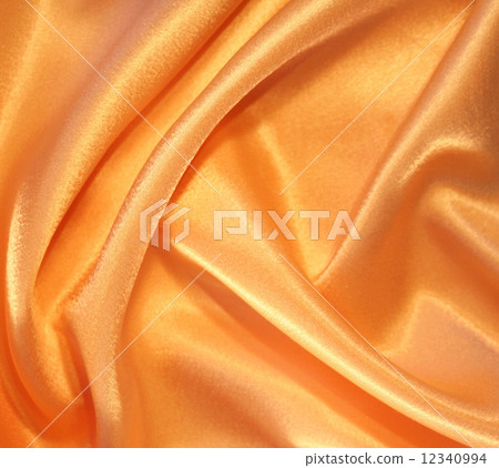 Smooth elegant golden silk as background Smooth elegant golden silk as background 12340994