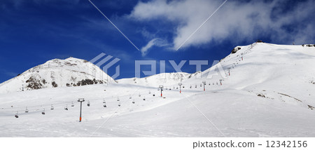 Panorama of ski slope at sunny winter day Panorama of ski slope at sunny winter day 12342156