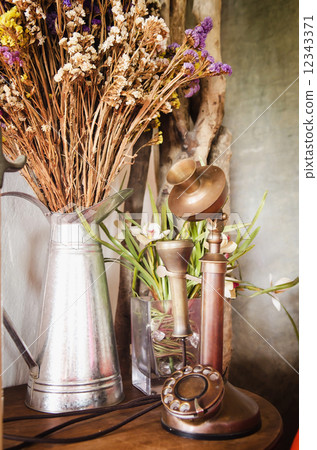 Retro telephone on table Retro telephone on table 12343371