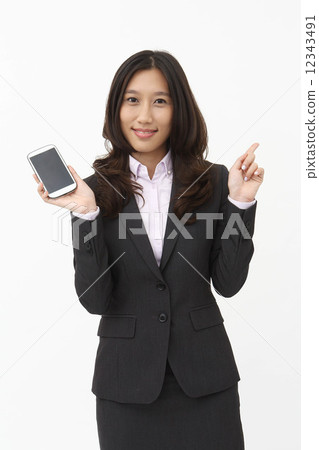 Asian business woman with mobile 12343491