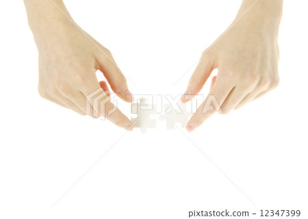 puzzle in hands 12347399