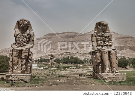 colossi of memnon gigantic statues in Luxor Egypt colossi of memnon gigantic statues in Luxor Egypt 12350948