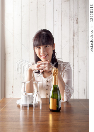 Champagne and a young lady Champagne and a young lady 12358118