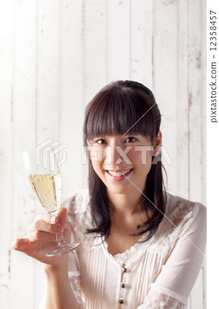 Champagne and a young lady Champagne and a young lady 12358457