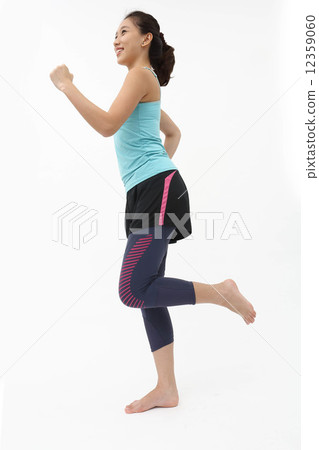 Asian women exercising 12359060