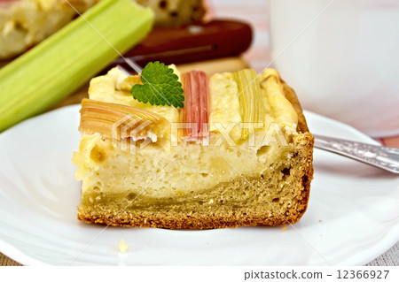 Pie with curd and rhubarb on plate 12366927