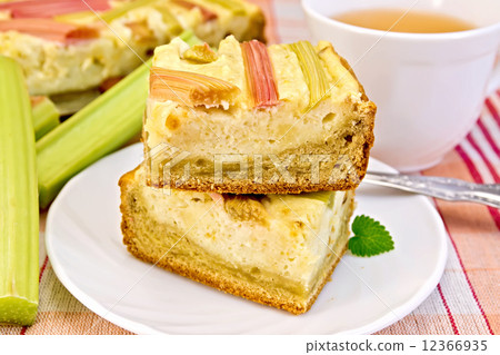 Pie with curd and rhubarb on tablecloth 12366935