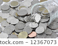 Coins over the glass be comparable to greed of human 12367073