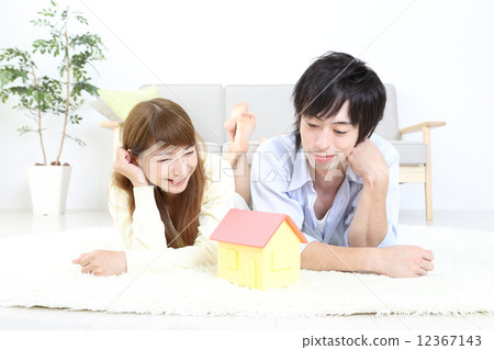 Home and young couple 12367143