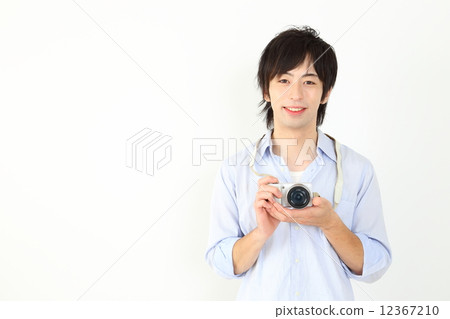 A man with a camera 12367210