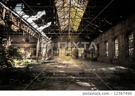 Abandoned industrial interior 12367490