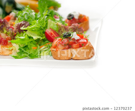 original Italian fresh bruschetta served with fresh salad and ve original Italian fresh bruschetta served with fresh salad and ve 12370237