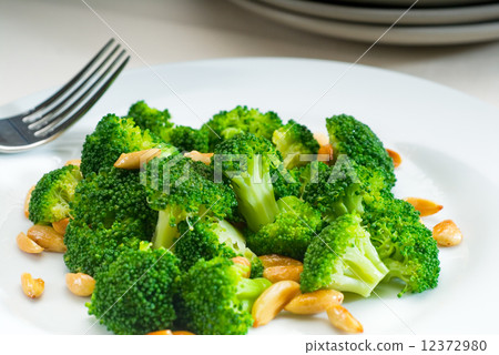 fresh sauteed broccoli and almonds fresh sauteed broccoli and almonds 12372980