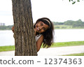Young Indian Girl playing in park 12374363