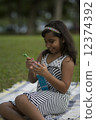Young Indian Girl playing in park 12374392