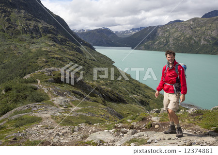 Dutch hiker at Knutshoe Mountain (Jotunheimen National Park, Opp 12374881