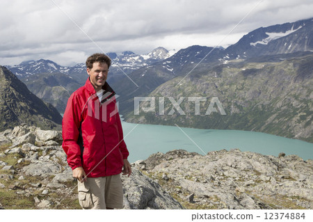 Dutch hiker at Knutshoe Mountain (Jotunheimen National Park, Opp 12374884