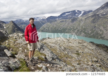 Dutch hiker at Knutshoe Mountain (Jotunheimen National Park, Opp 12374885