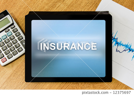 insurance word on digital tablet insurance word on digital tablet 12375697