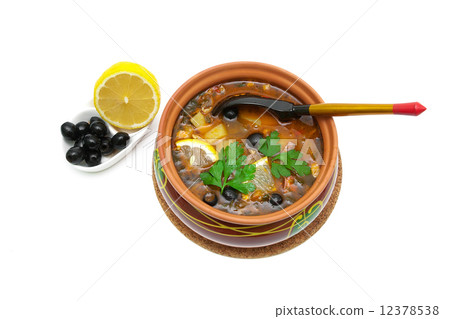 Soup thistle, olives and lemon isolated on a white background Soup thistle, olives and lemon isolated on a white background 12378538