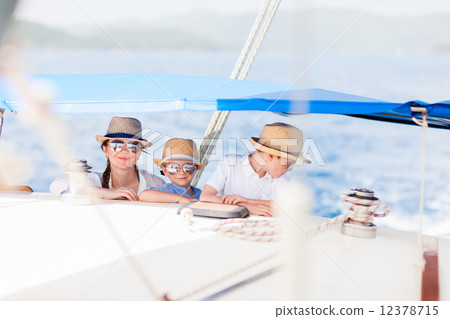 Mother and kids at luxury yacht 12378715