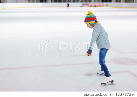 Little girl ice skating 12378729