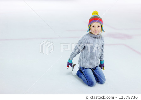 Little girl ice skating 12378730