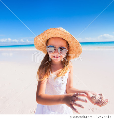 Adorable little girl at beach Adorable little girl at beach 12378817