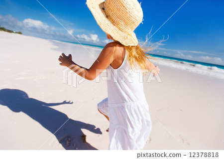 Adorable little girl at beach Adorable little girl at beach 12378818