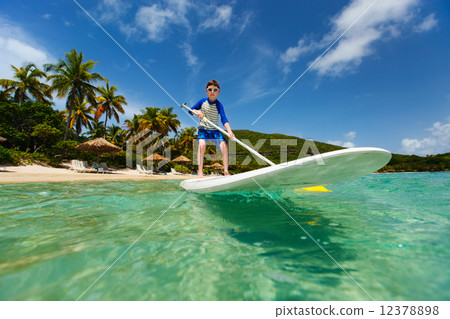 Little boy on stand up paddle board Little boy on stand up paddle board 12378898