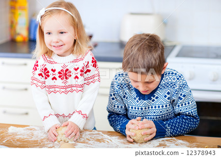 Kids baking cookies Kids baking cookies 12378943