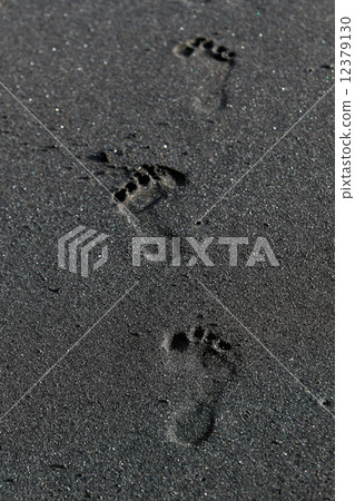 Footprints at beach Footprints at beach 12379130