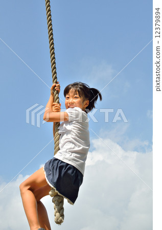 Girls who enjoy playing with park play equipment Girls who enjoy playing with park play equipment 12379894