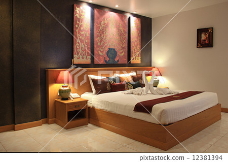 Beautiful bed in traditional Thai setting 12381394