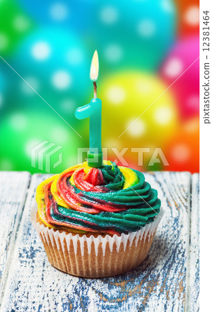 Cupcake with number one on the background 12381464