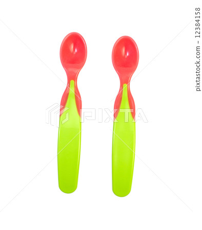 Two colorful baby spoons Two colorful baby spoons 12384158