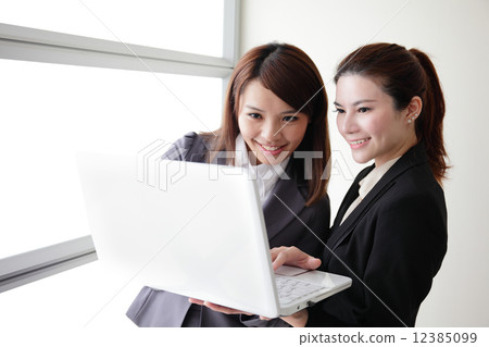 Business women look and smile conversation Business women look and smile conversation 12385099