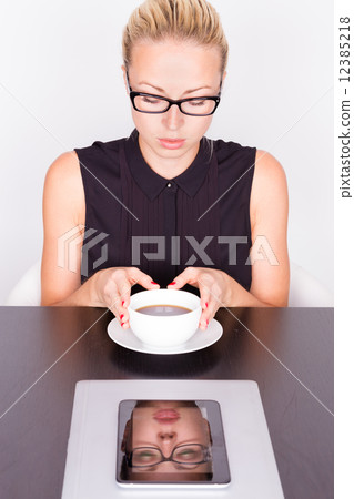 Business woman with cup of coffee. 12385218