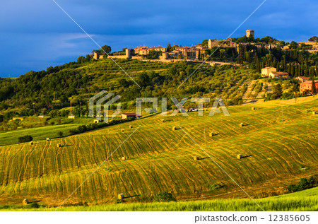 sunset view of Monticchiello sunset view of Monticchiello 12385605