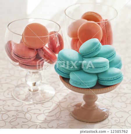 Macarons glass bowl on white background 12385762