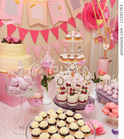 Sweet holiday buffet with cupcakes and meringues Sweet holiday buffet with cupcakes and meringues 12385763