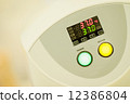 Blood analyzer, with temperature monitor and two big buttons, medical equipment  12386804
