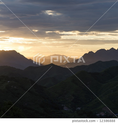 Sunset mountain scenery . Sunset mountain scenery . 12386888
