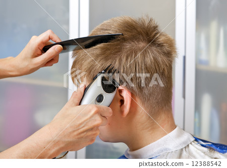 Man's hairstyle by means of the special machine for a hairstyle Man's hairstyle by means of the special machine for a hairstyle 12388542