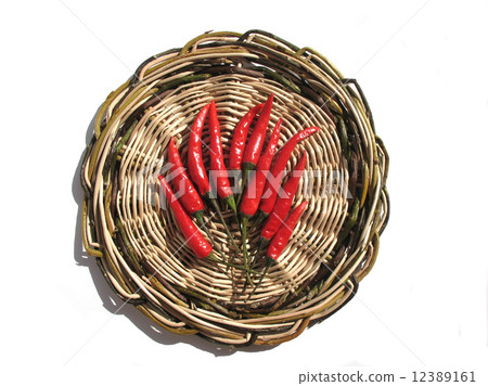 Red chili peppers on a wooden surface 12389161