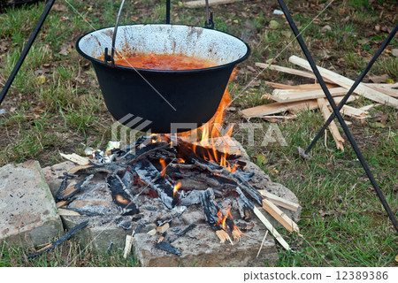 Kettle on a fire Kettle on a fire 12389386