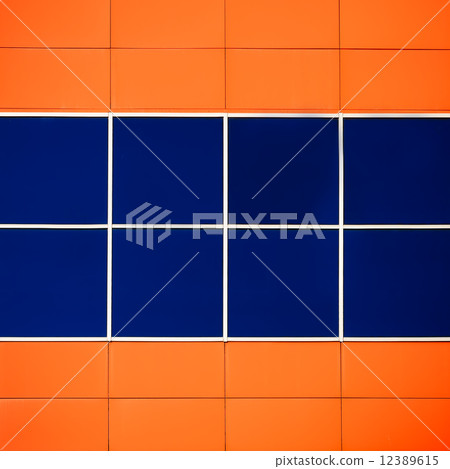 Windows of modern office building 12389615