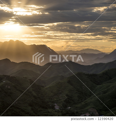 Sunset mountain scenery 12390420