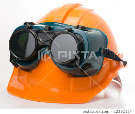 Safety hat and goggles glasses isolated 12392154